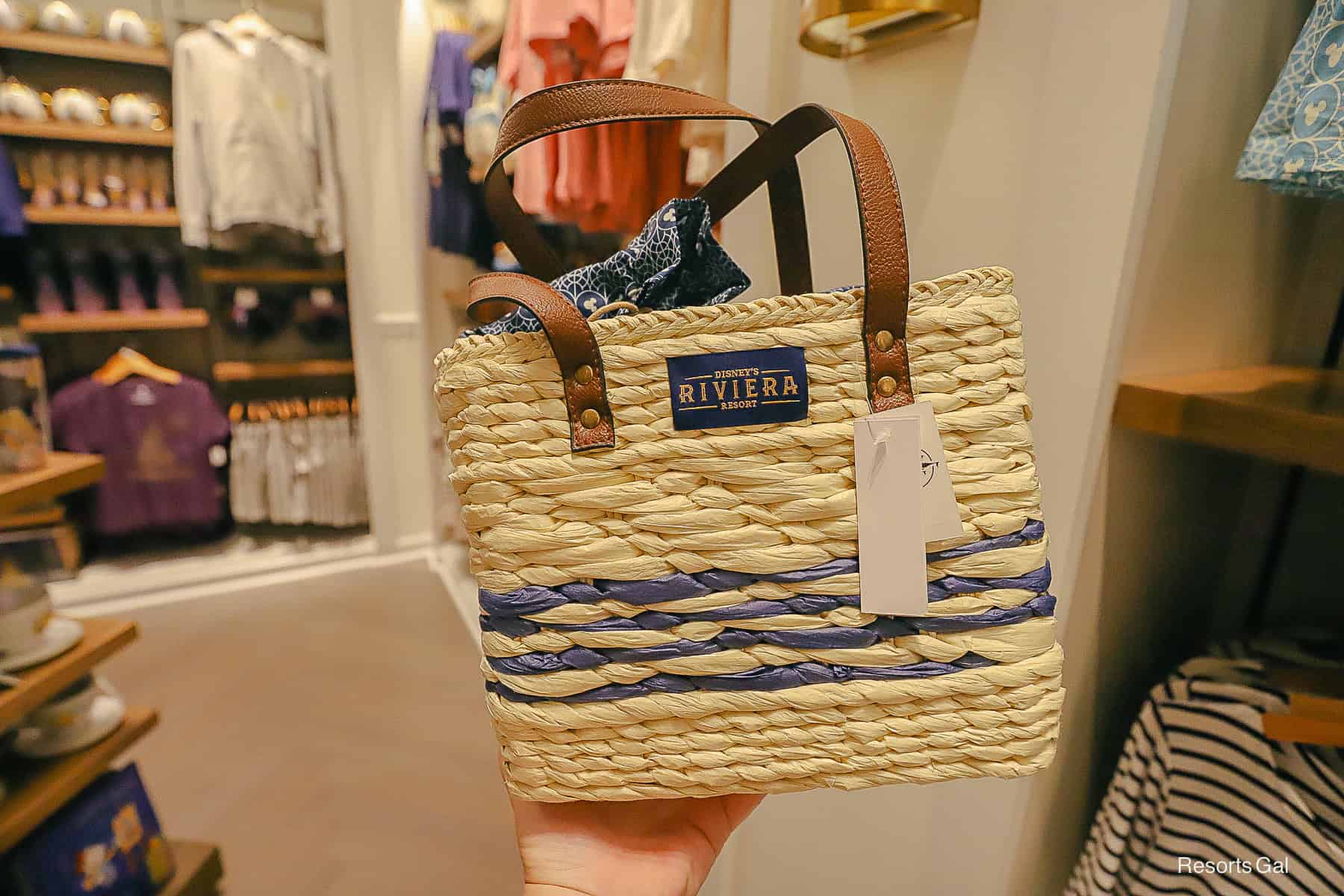 a straw bag with the Disney's Riviera Resort logo 