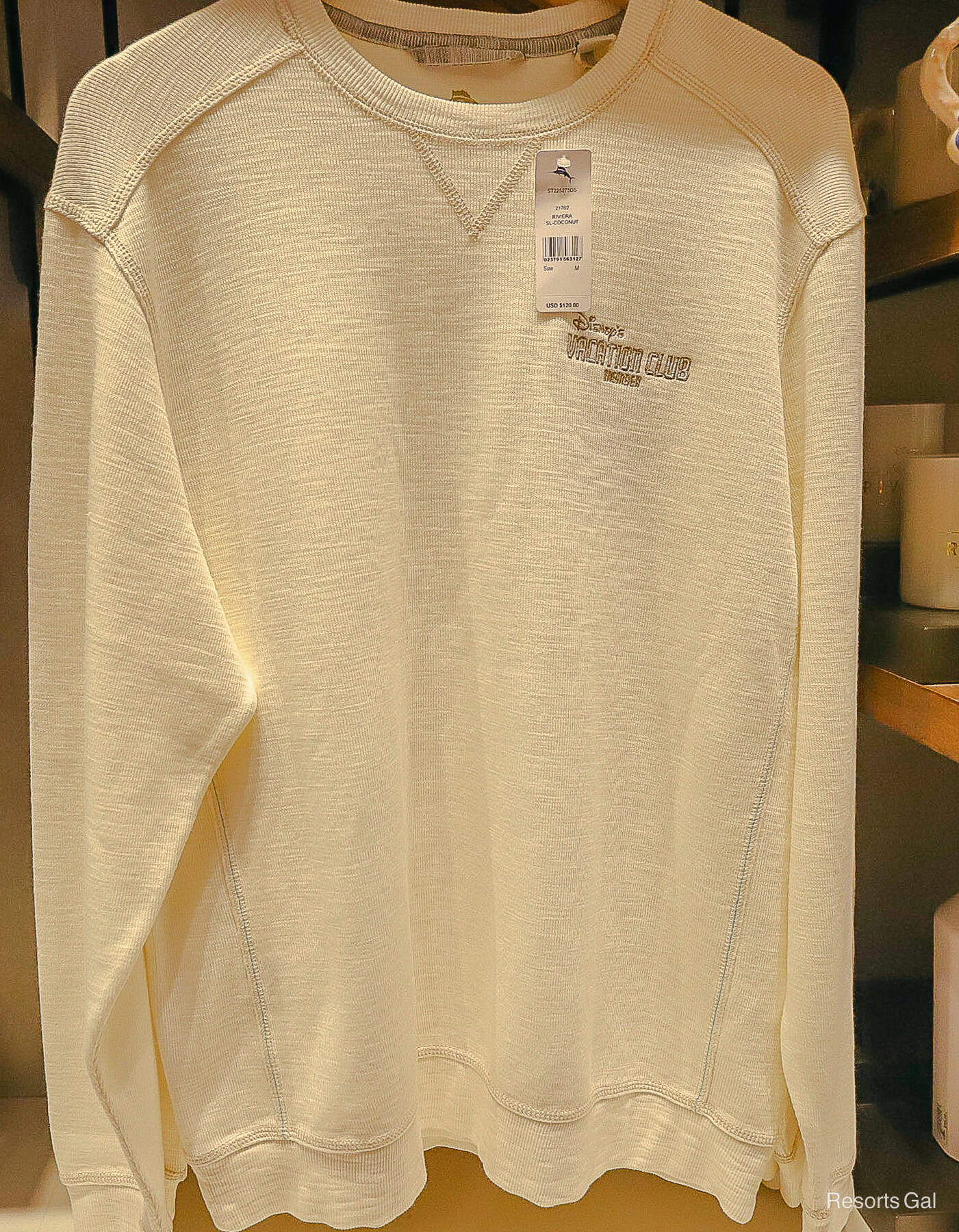 a sweatshirt (front side) with the Disney Vacation Club logo 