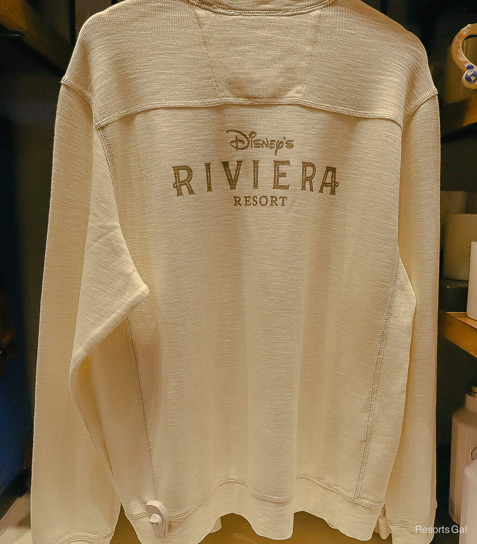 the back side of the sweatshirt says Disney's Riviera Resort 
