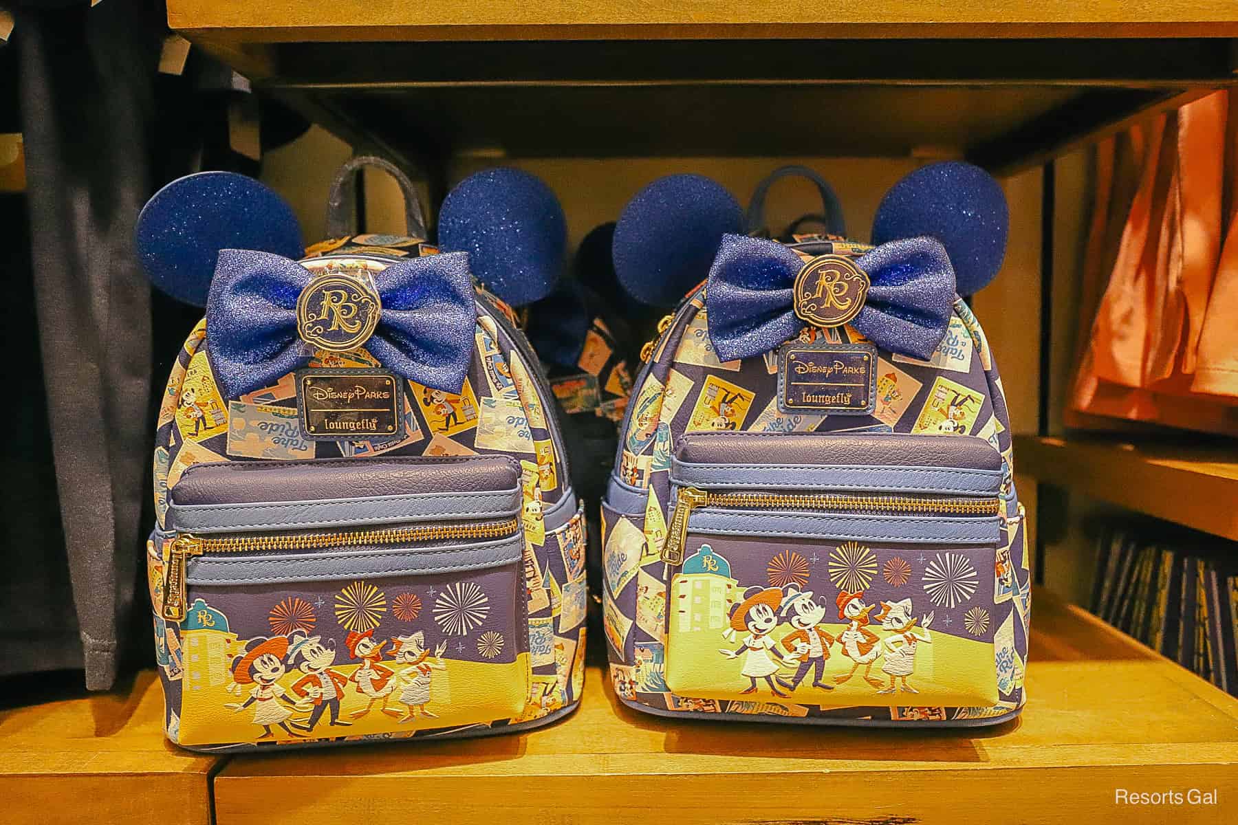 a Loungefly backpack with the "RR" resort logo 