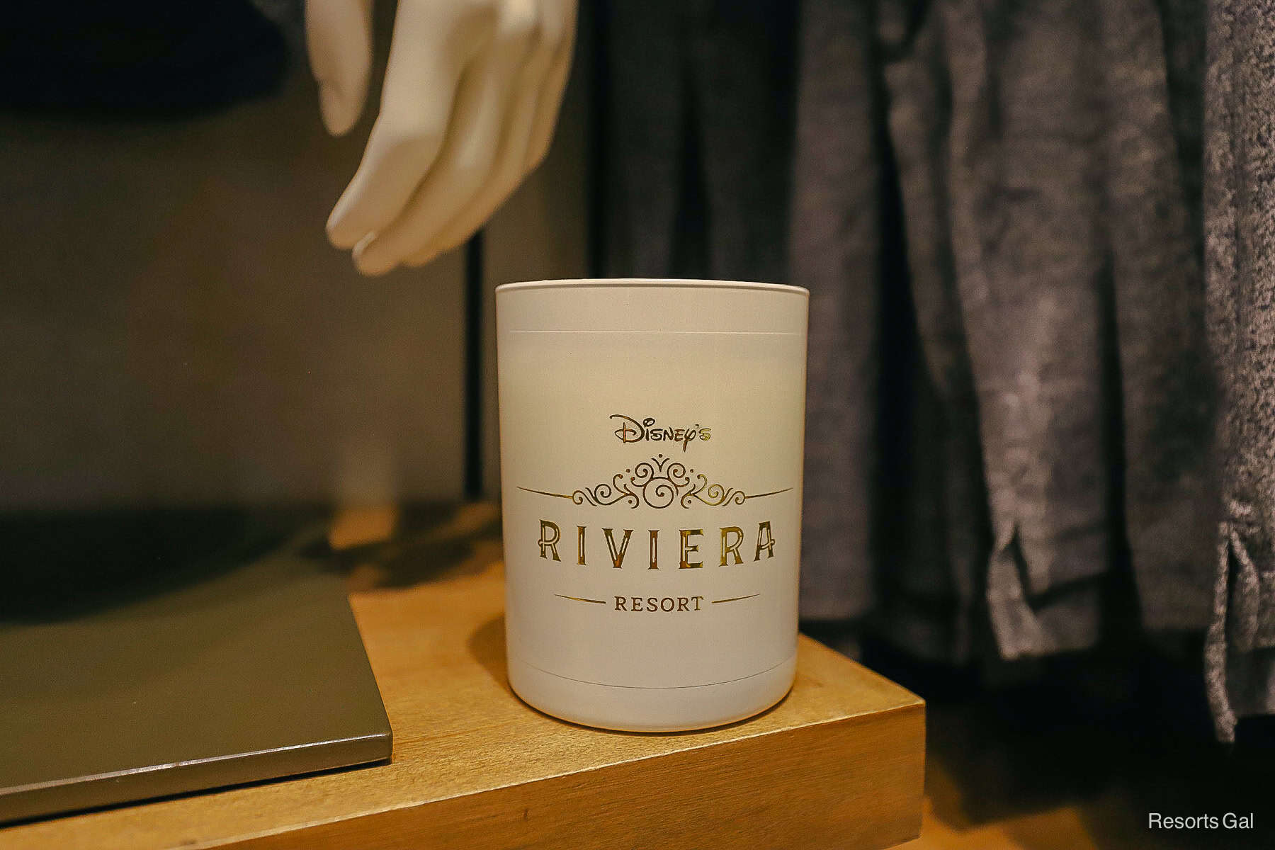 a candle with Disney's Riviera Resort logo 