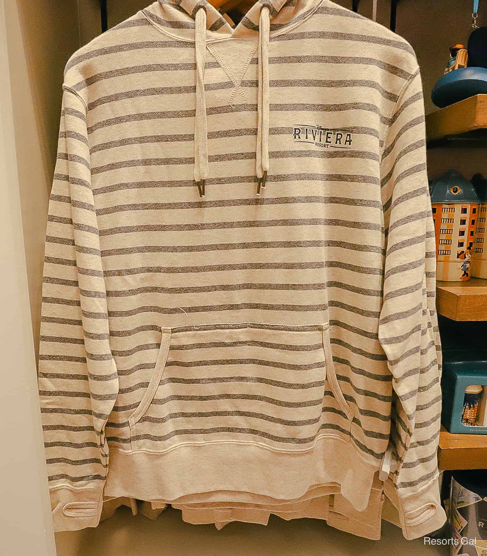 a striped hoodie with grey and cream stripes front 
