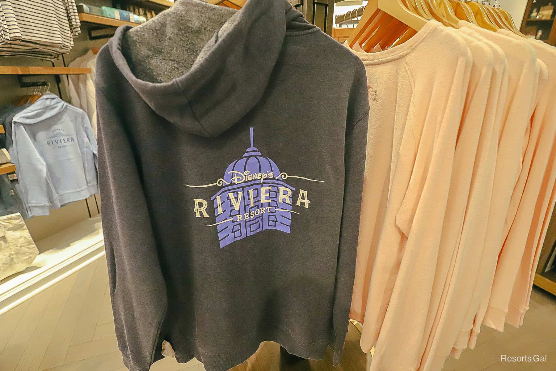 dark grey sweatshirt with Riviera Resort on back 