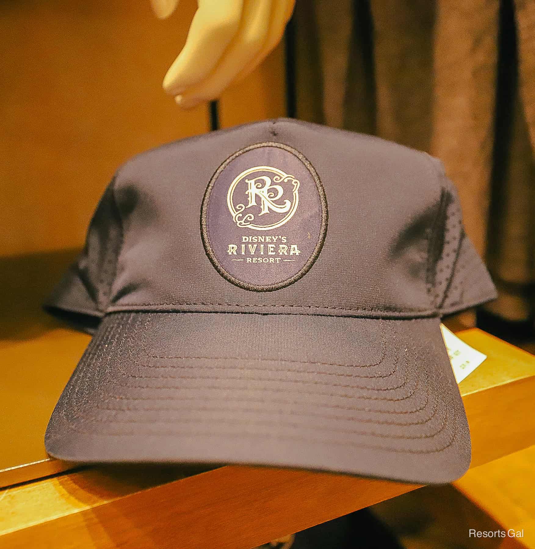 a baseball hat with Disney's Riviera Resort logo 