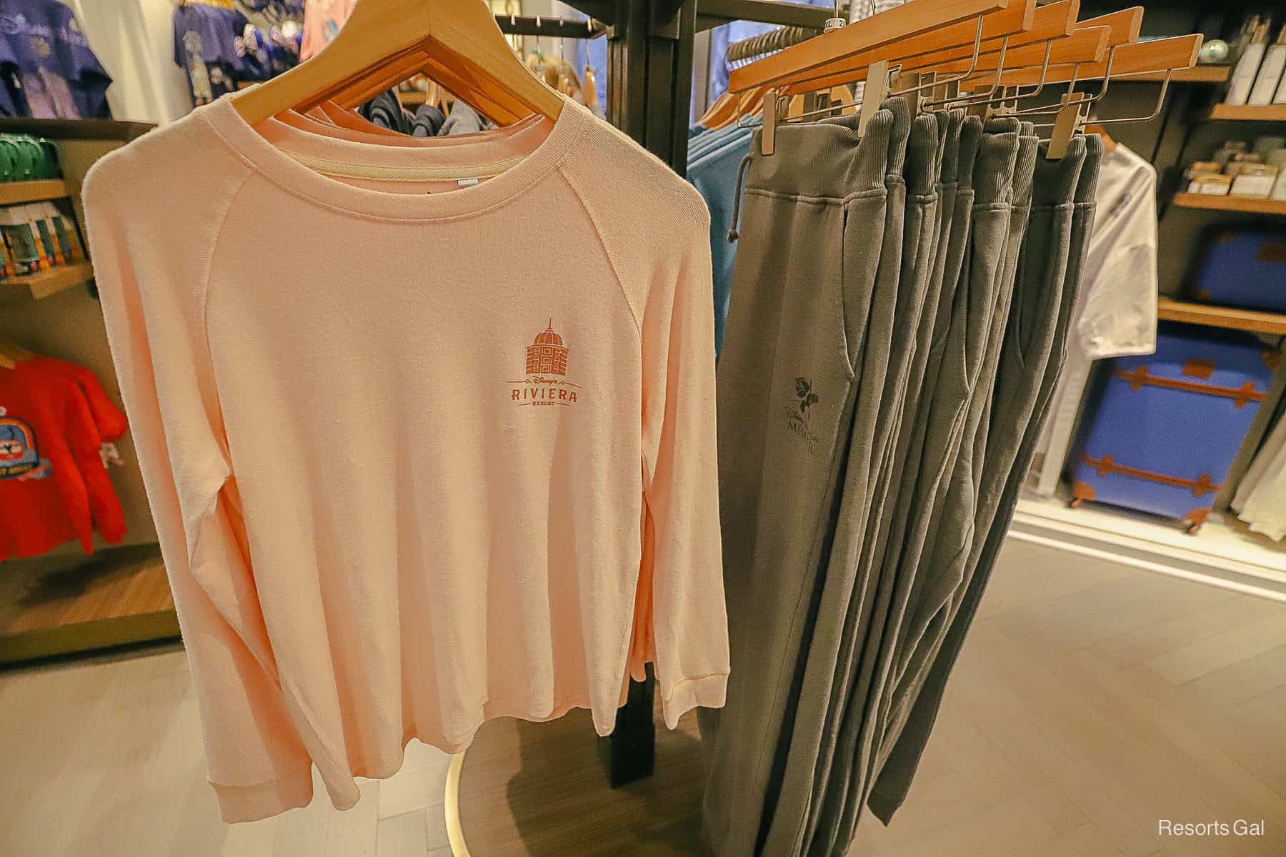 a pink long sleeve shirt with small logo 