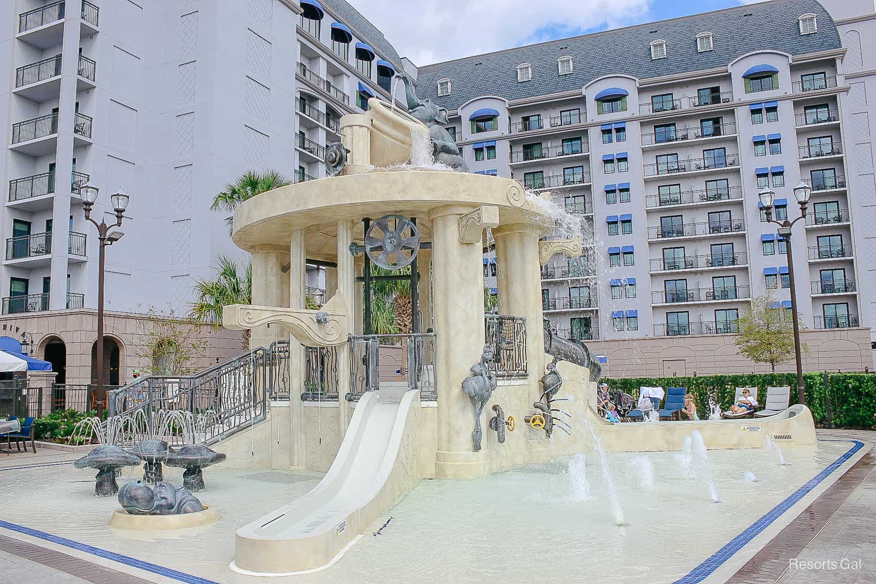 a large view of the water play area with various splash elements 