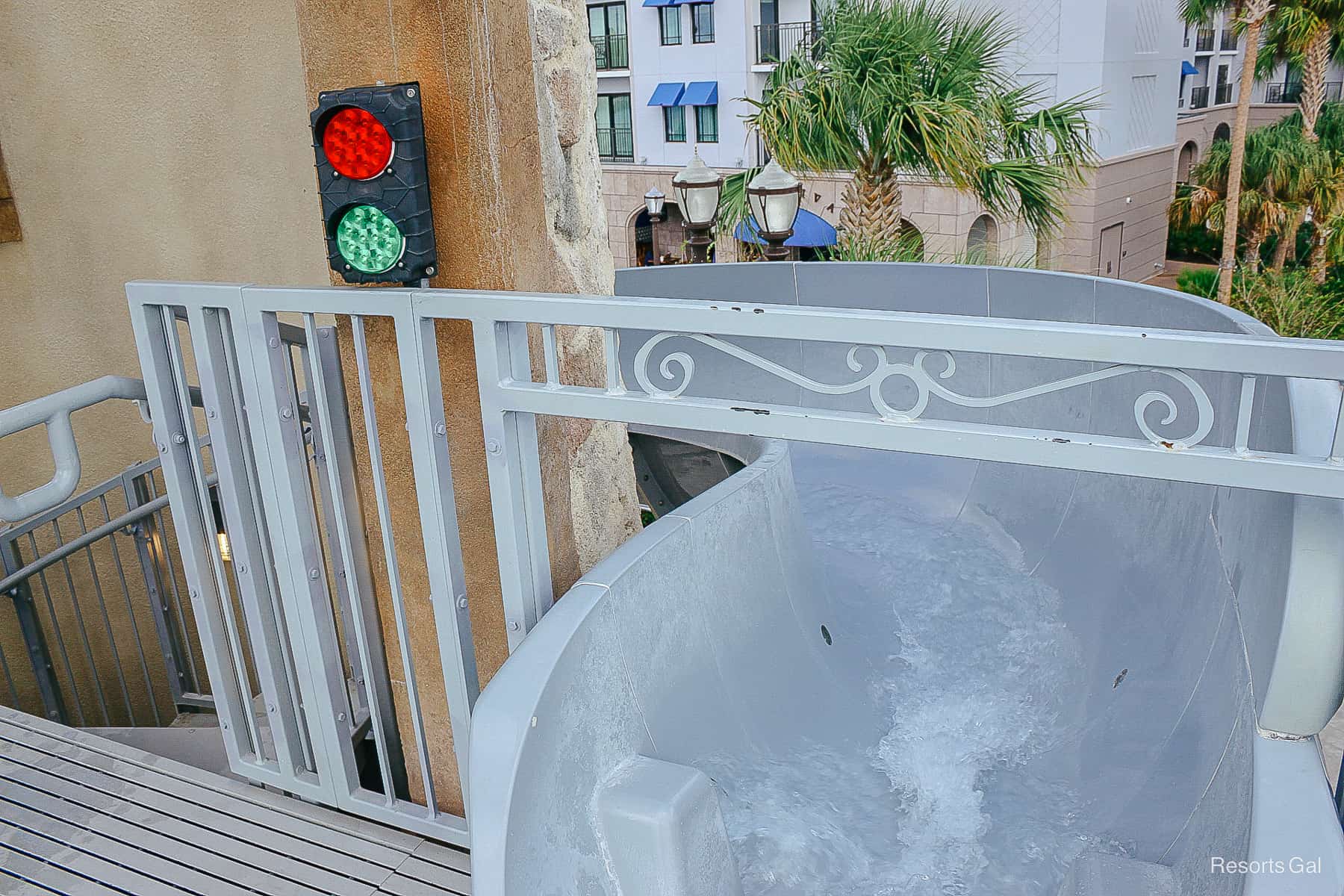 a red and green traffic light tells guests to stop or go on the slide at Riviera 