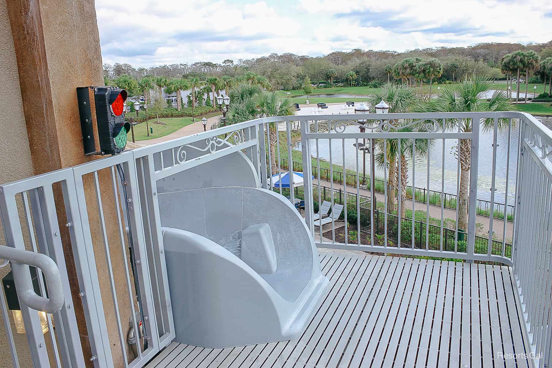 a platform where guests wait to ride the water slide 