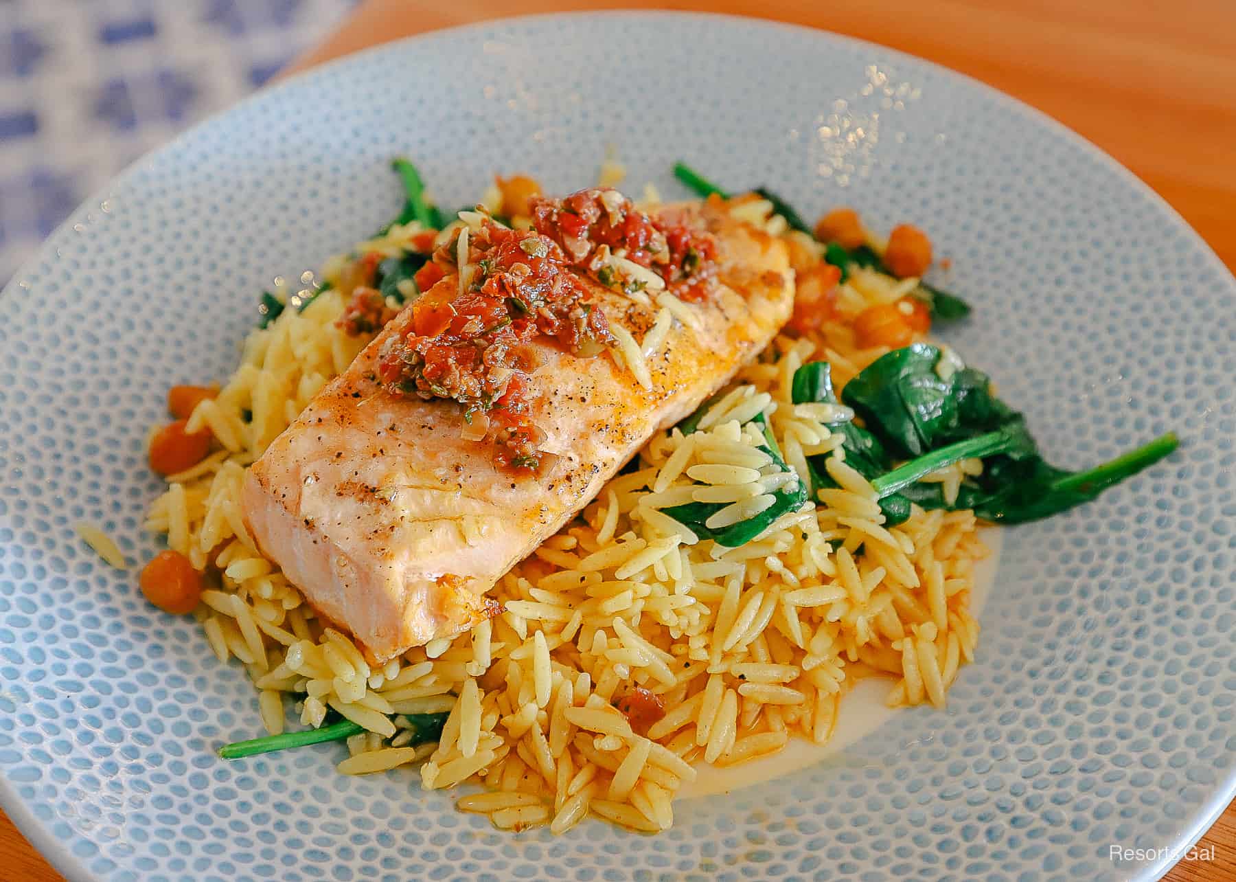 a plate with orzo and Salmon 