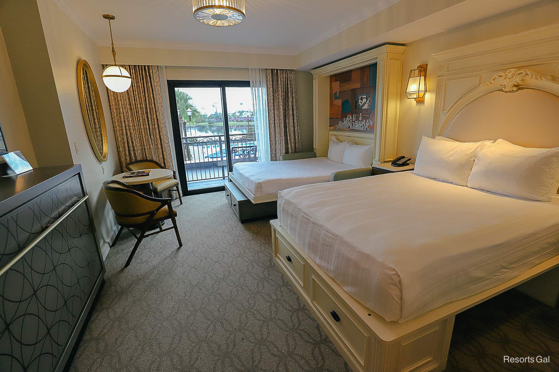 the two queen-size beds in a deluxe studio at Disney's Riviera 