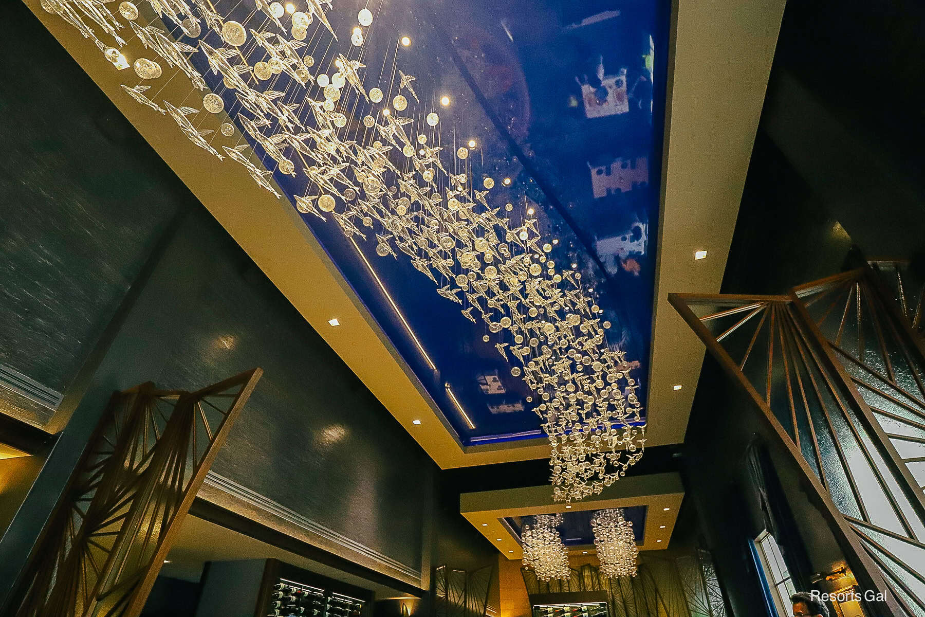 the glass fish ceiling of Flying Fish, a signature restaurant at Disney World 