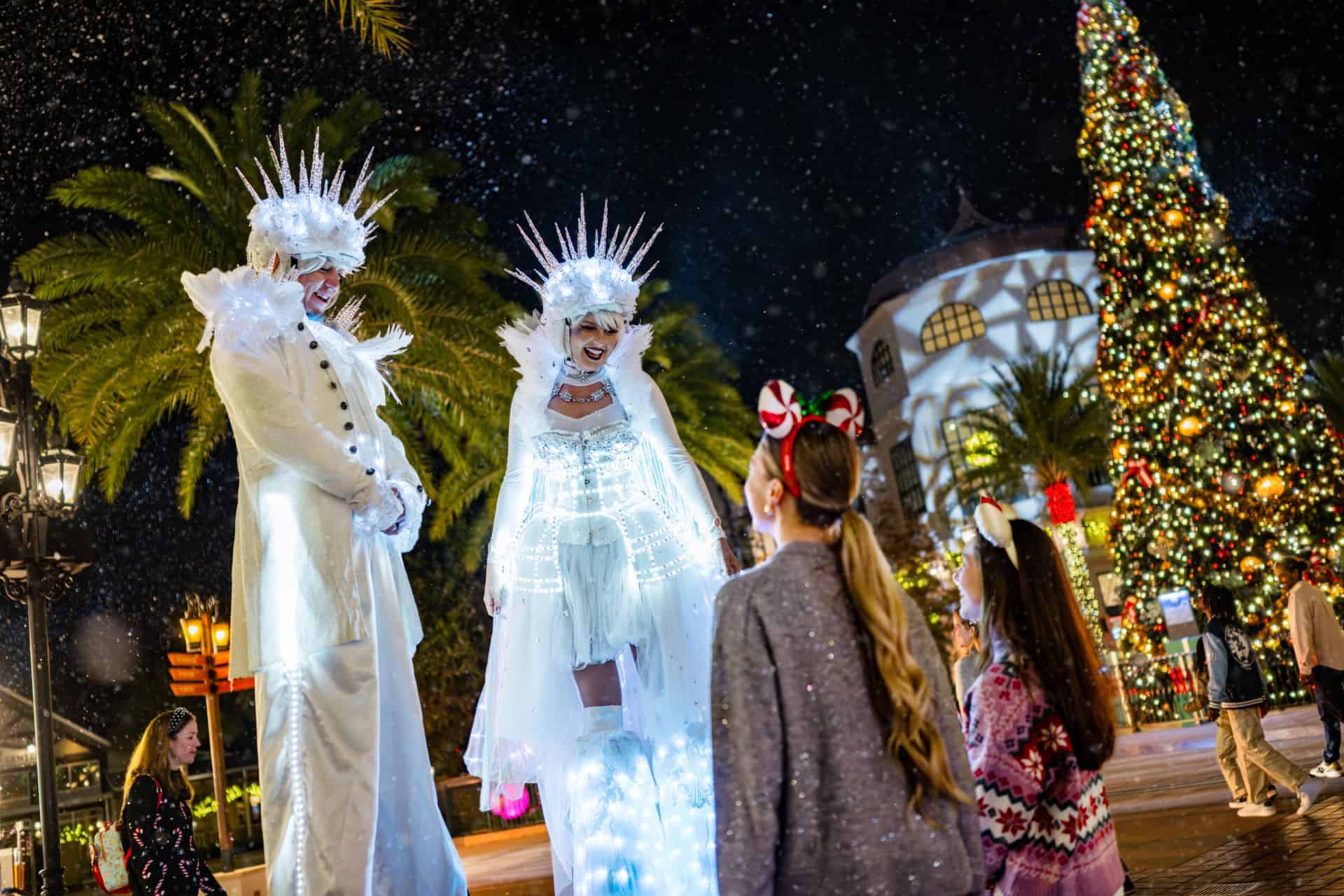 holiday skater stilt walkers at Disney Springs