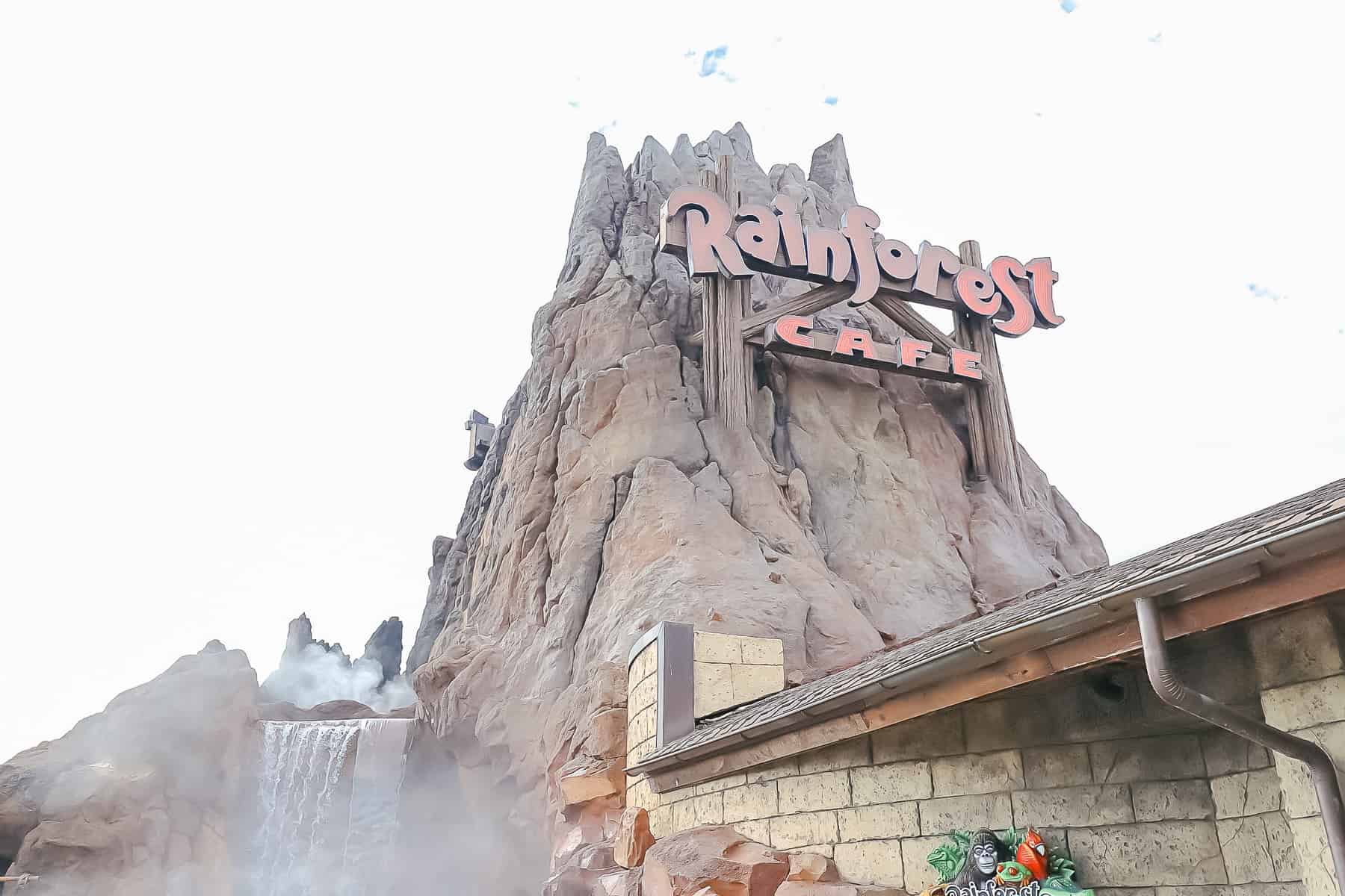 Sign that says Rainforest Cafe on the volcano at Disney Springs. 