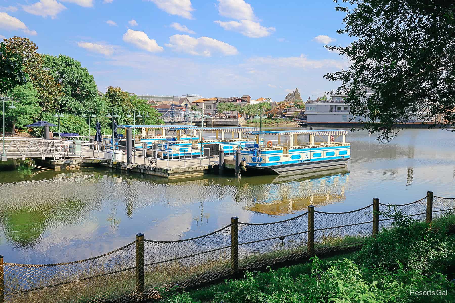 two boats docked at the boat dock at Disney Springs