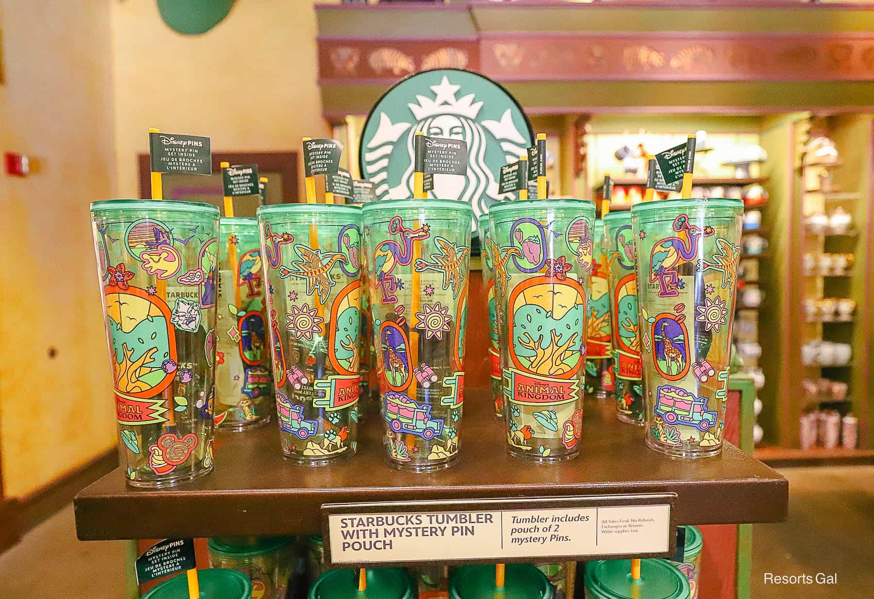 a display of Starbucks tumblers with mystery pin sets 