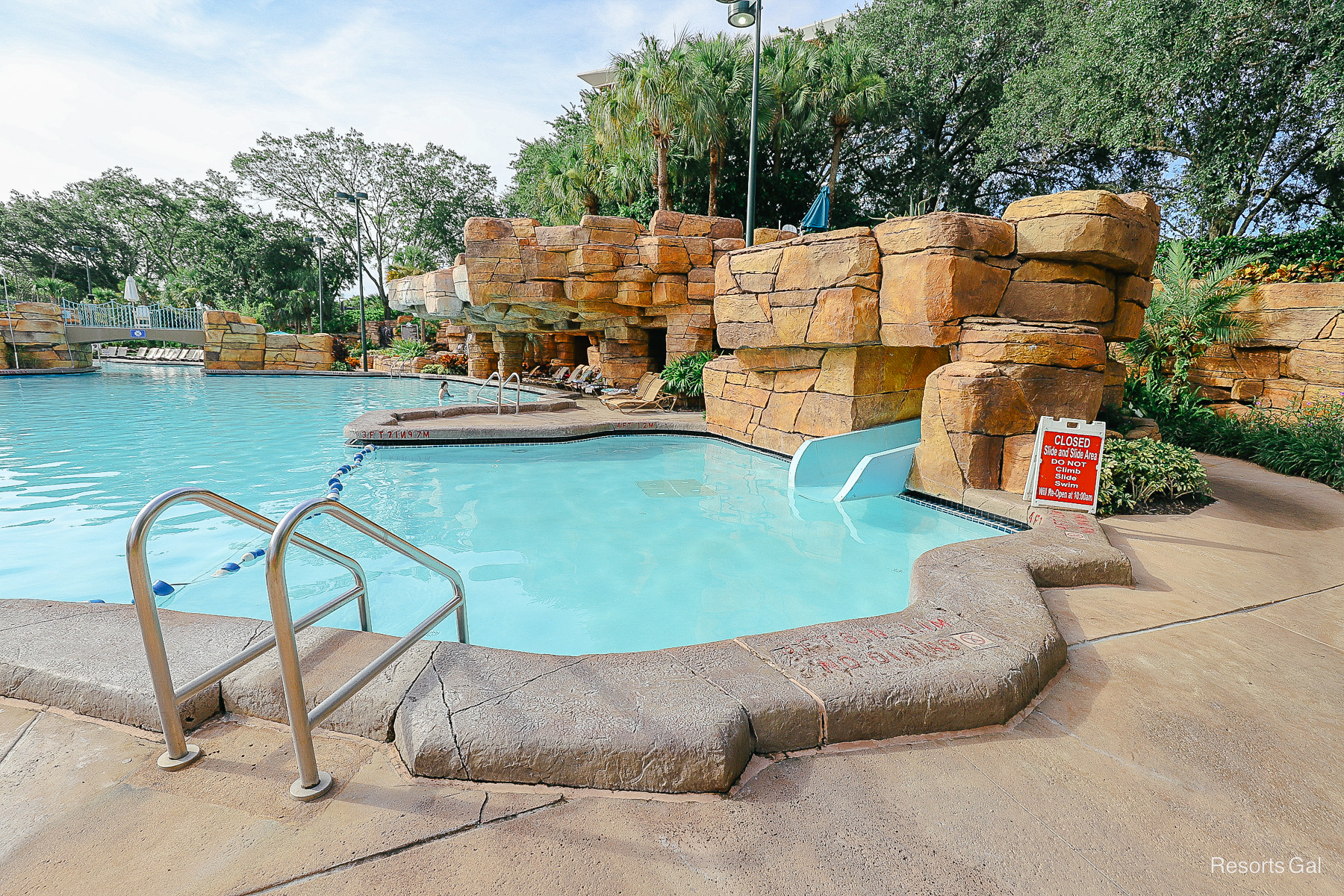 an area of the pool that has a rope partition where guests exit the water slide 