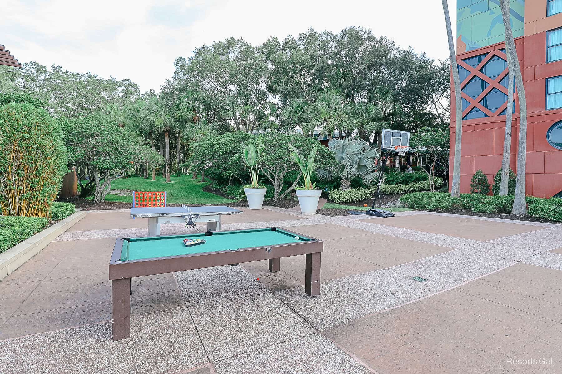 a pool table, a ping pong table, and a basketball court 