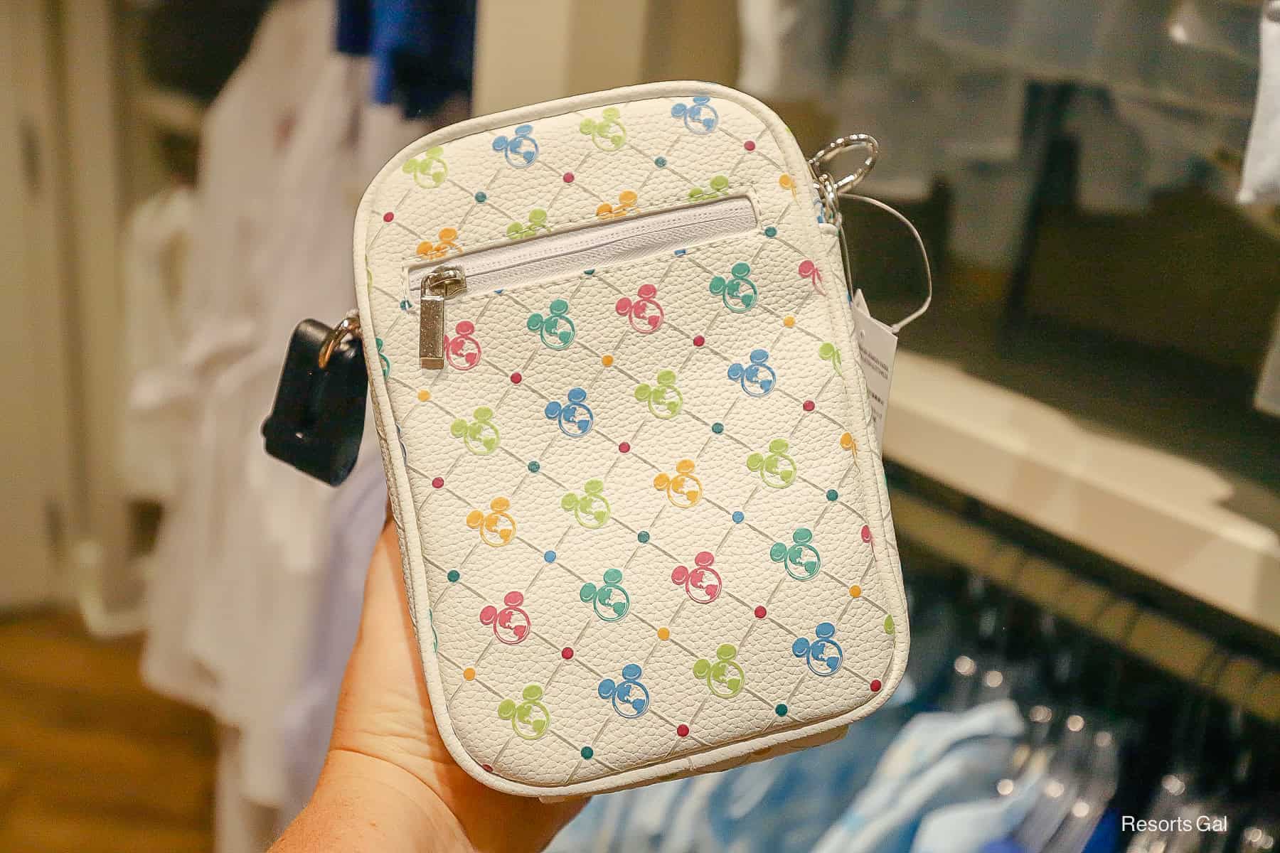 back of the DVC Mickey globe icon crossbody