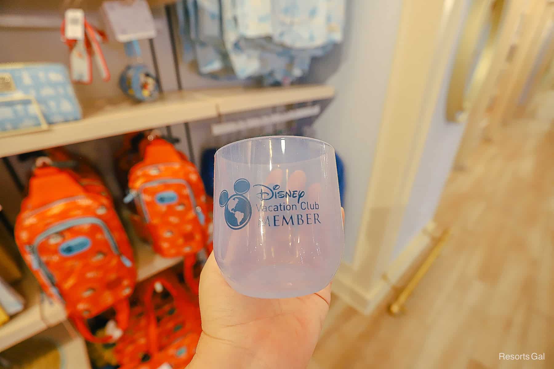 a clear rubber wine tumbler with the DVC logo