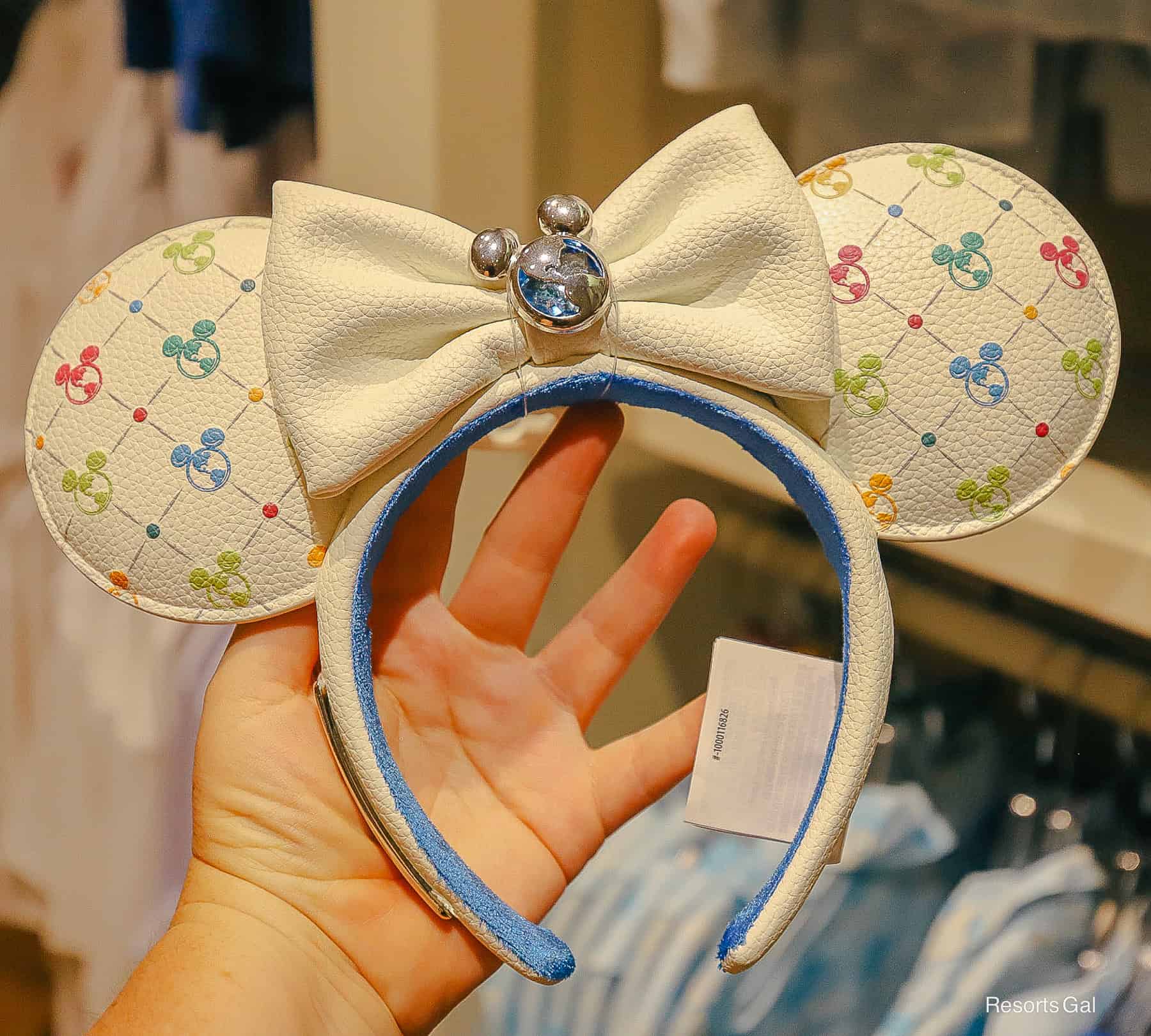 a pair of Minnie Ears that are DVC that match the crossbody