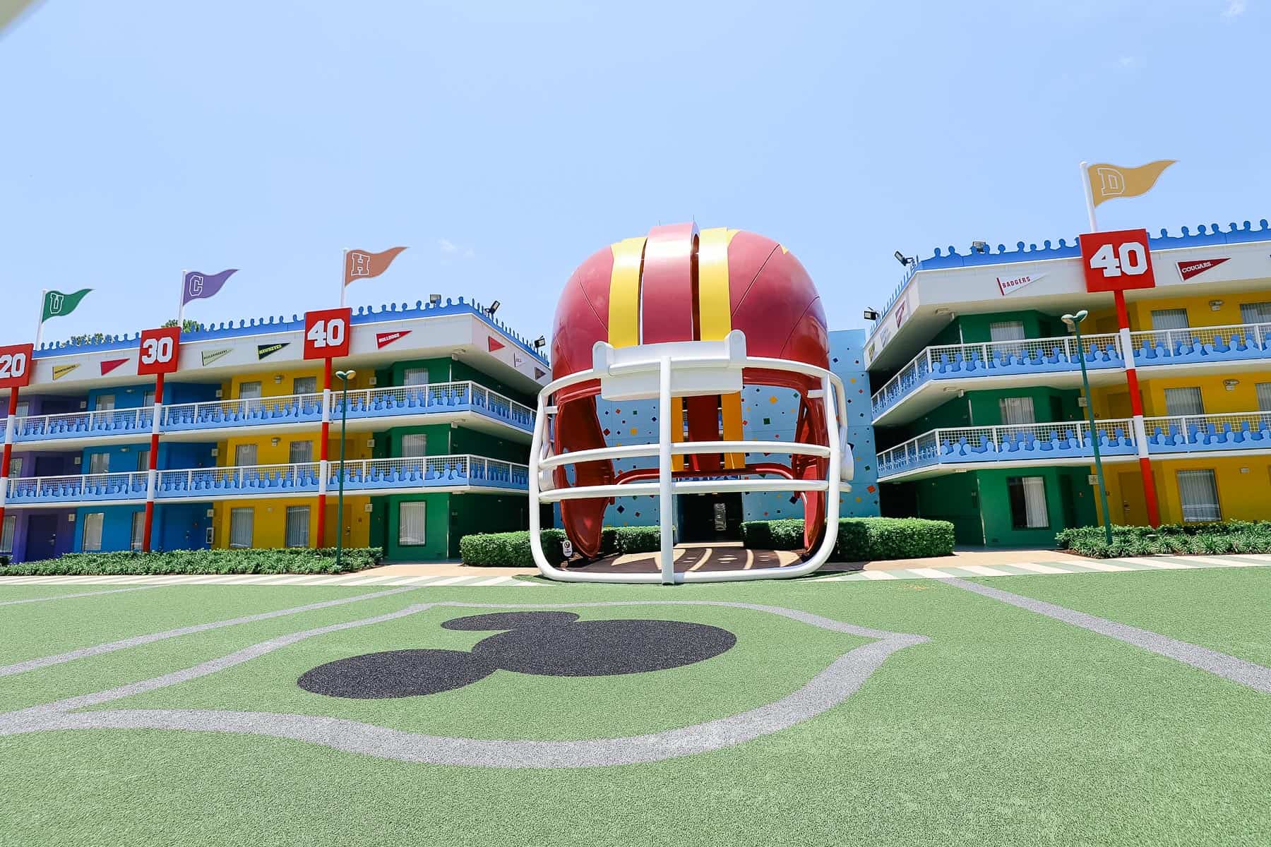 the football field in a section of Disney's All-Star Sports with a giant helmet