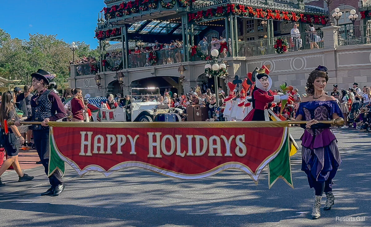 two villains in the rare holiday pre parade at Magic Kingdom