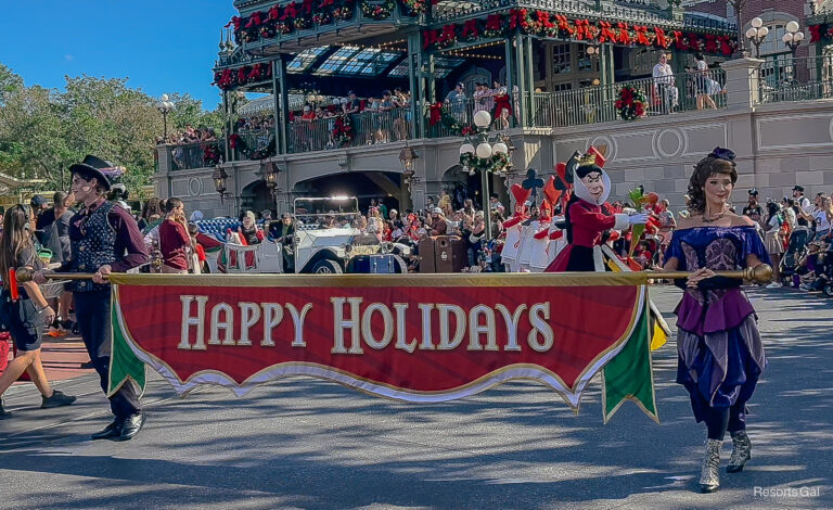 two villains in the rare holiday pre parade at Magic Kingdom