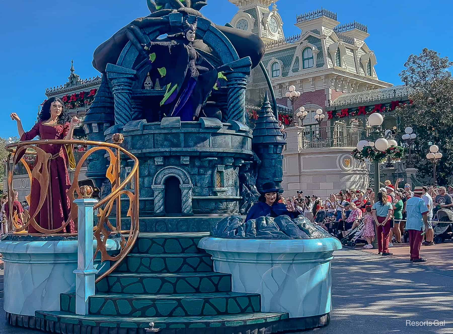a final float carries Mother Gothel, Maleficent, and the Evil Queen