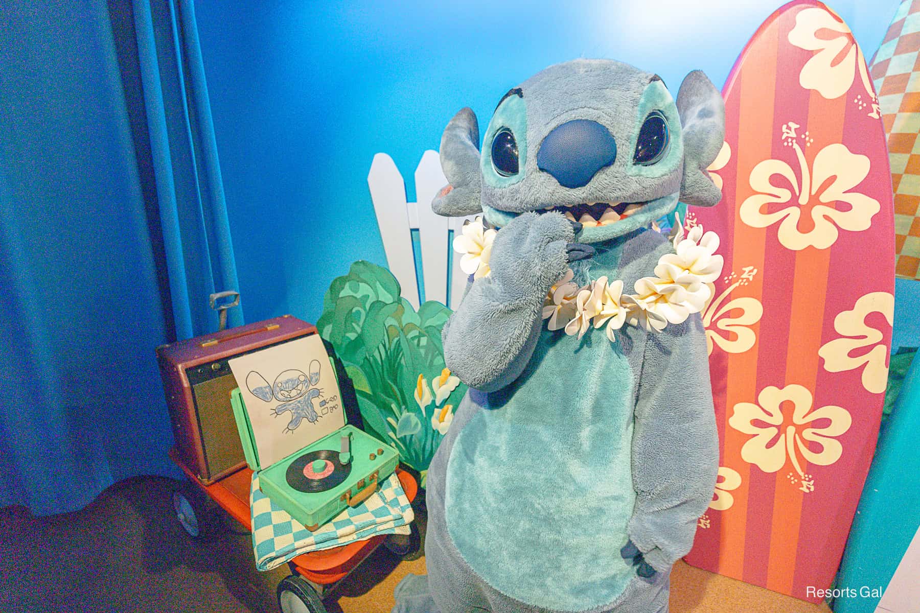 Stitch with hand to mouth laugh