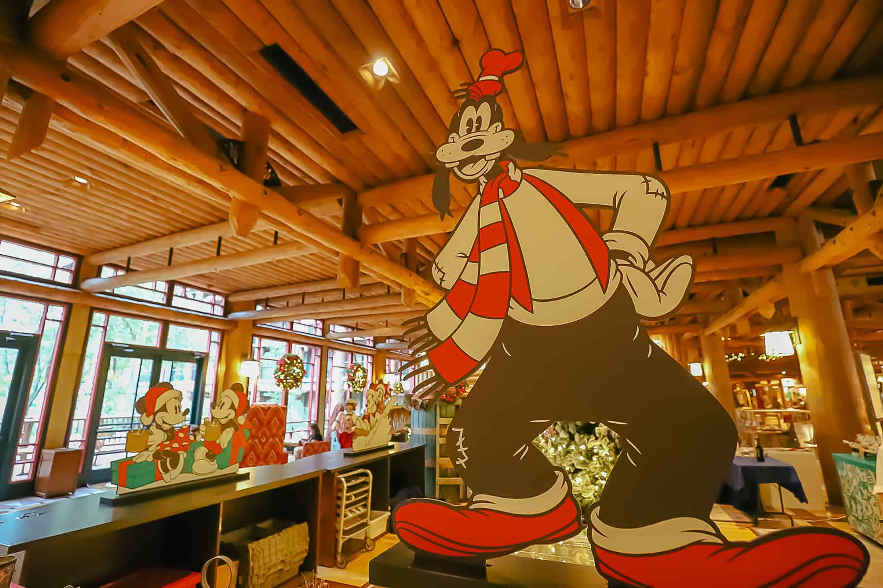 Cardboard cutout of Goofy in Christmas attire at Disney's Wilderness Lodge 