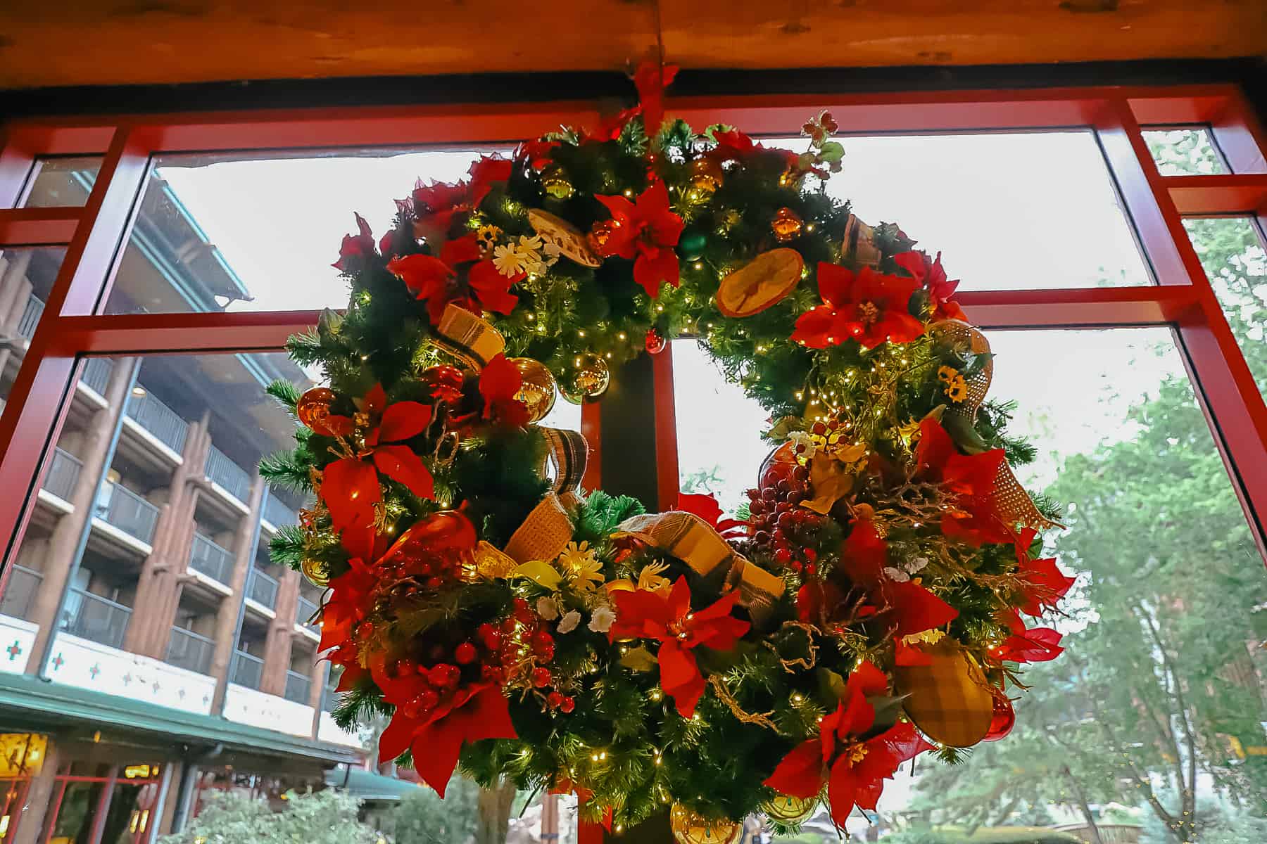 holiday wreath with pretty red accents 