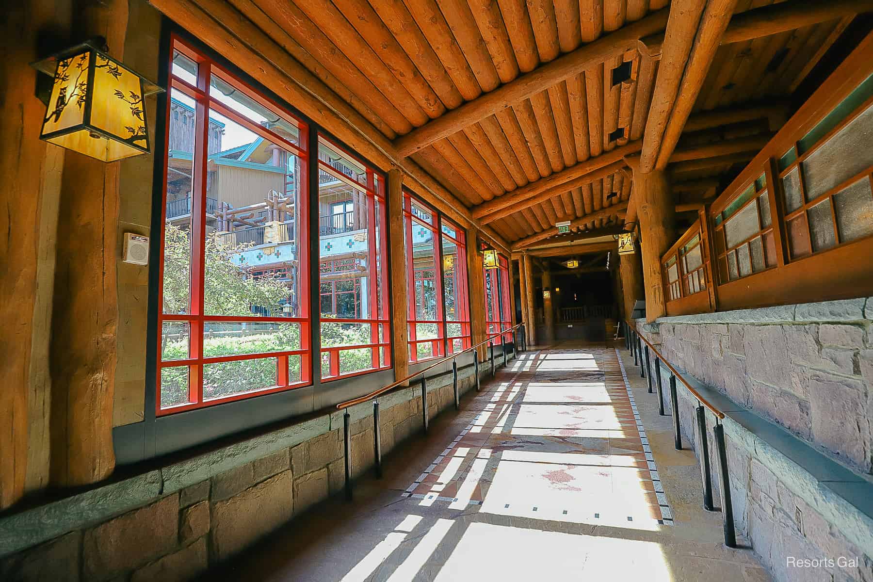 the sloped walkway between Wilderness Lodge's lobby and Roaring Fork 