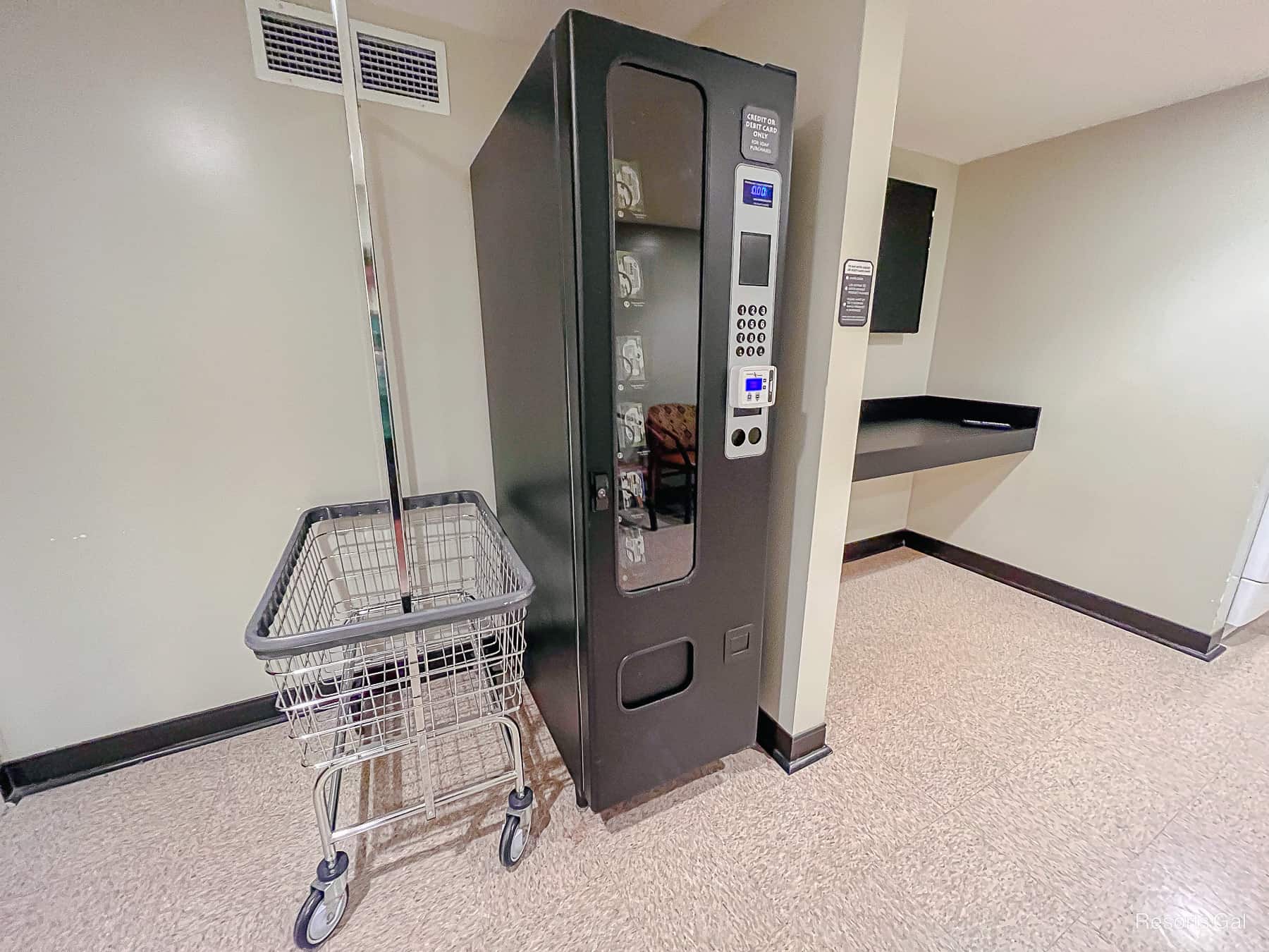 a rack on wheels where guests can move laundry from the washer to the dryer 