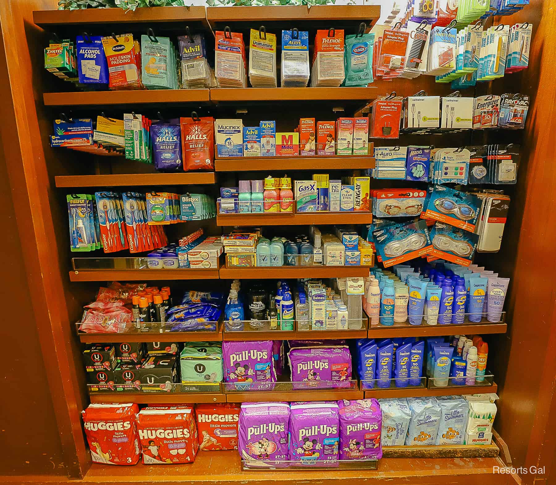 a display in the gift shop with over the counter medicine, health, and personal items 