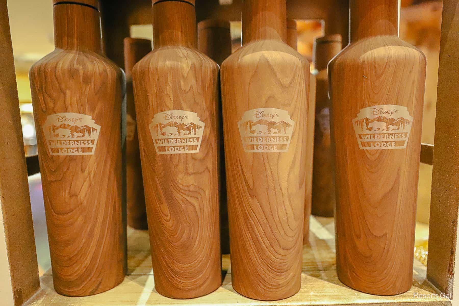 tumblers that have a wood grain look with Disney's Wilderness Lodge on them 