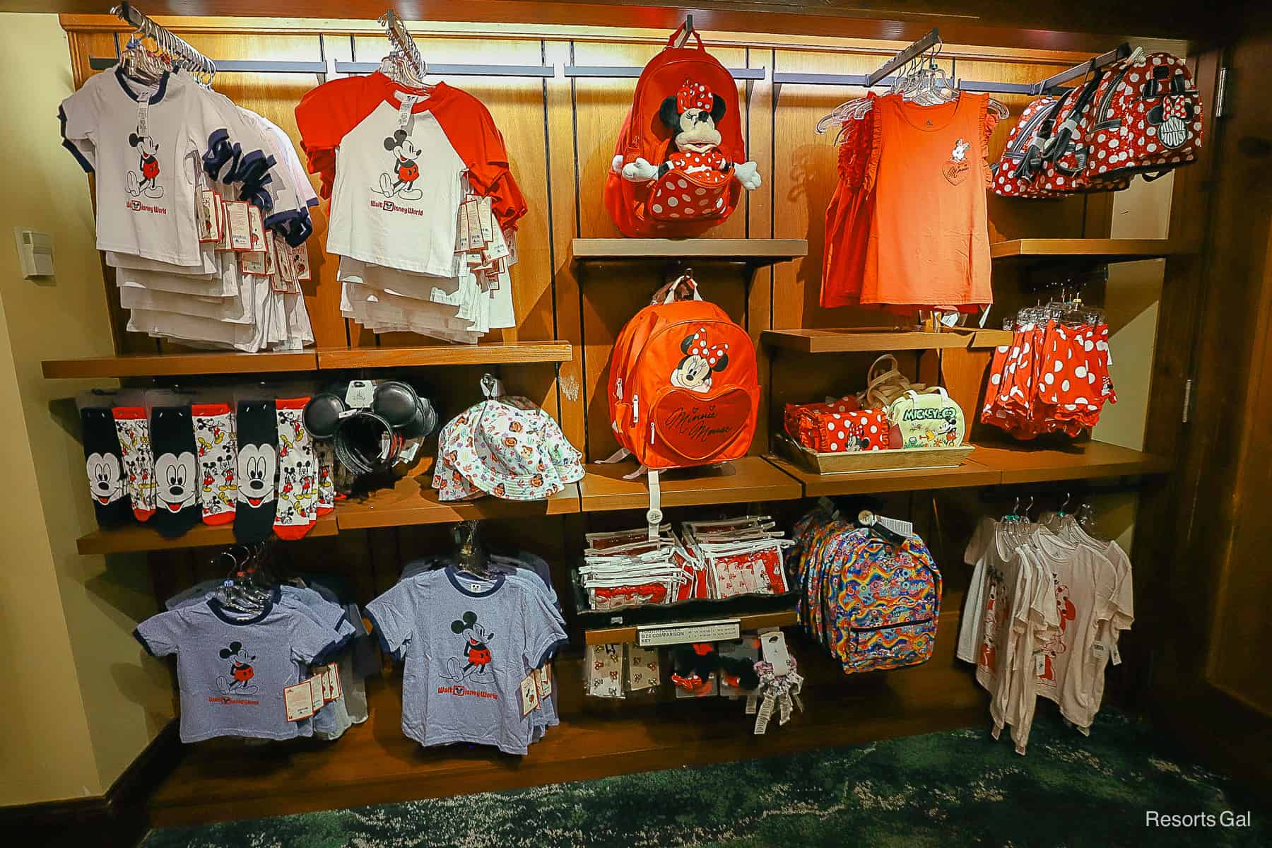 a display of Mickey and Minnie themed children's apparel 