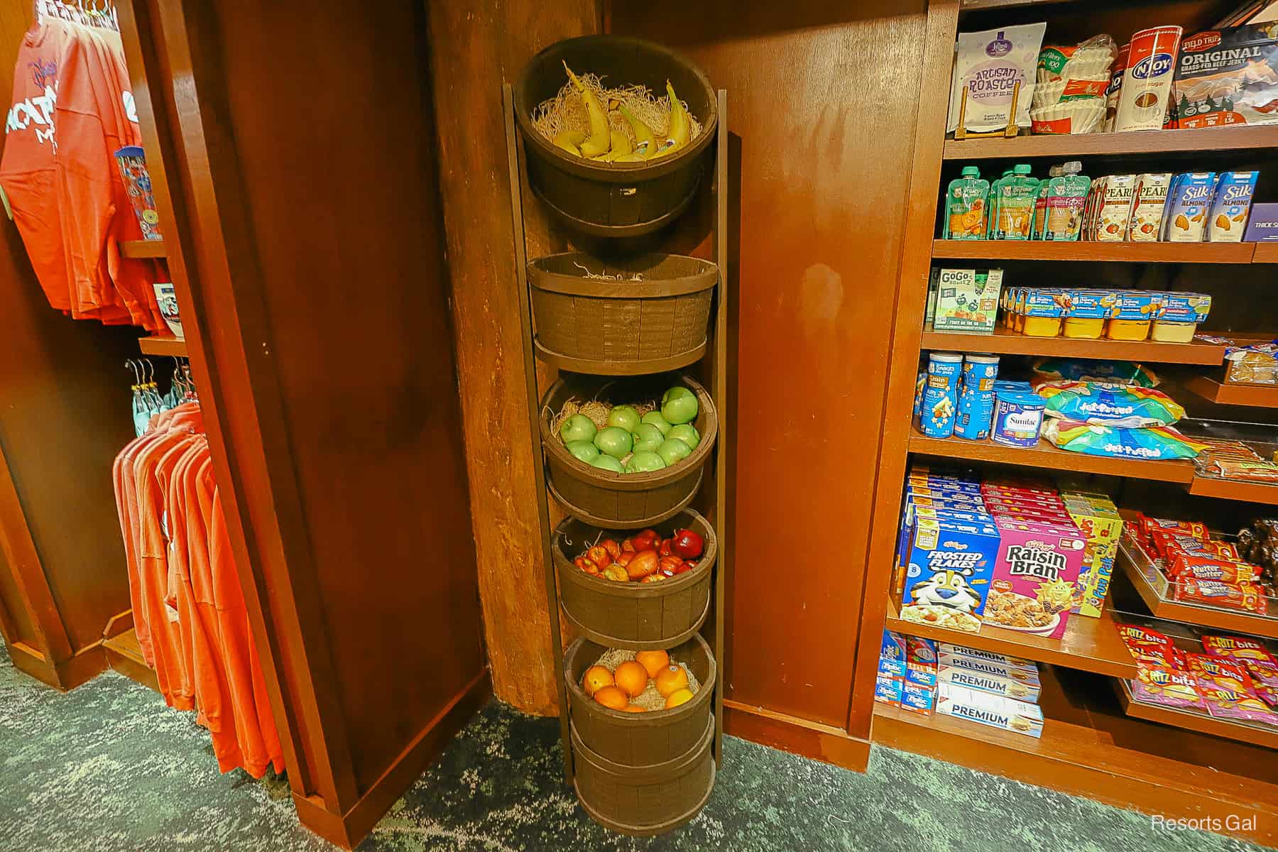 baskets with fresh fruit like apples, oranges, and bananas 