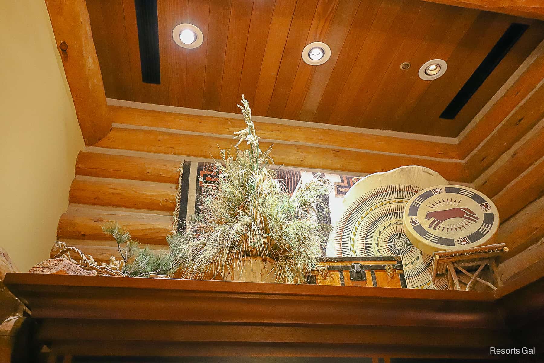 a themed display of Indian art on a shelf inside Wilderness Lodge Mercantile gift shop 