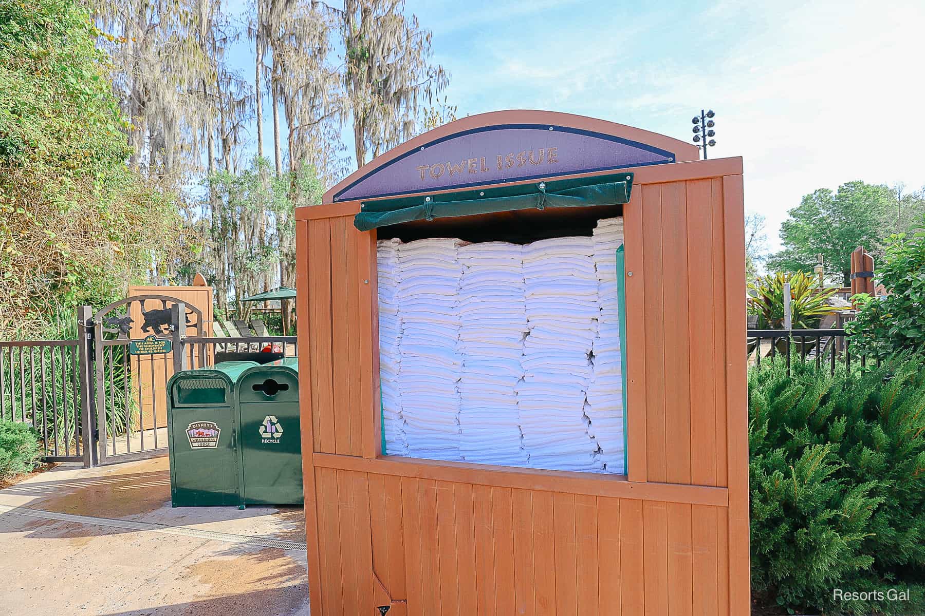 a towel bin stocked full of fresh towels 