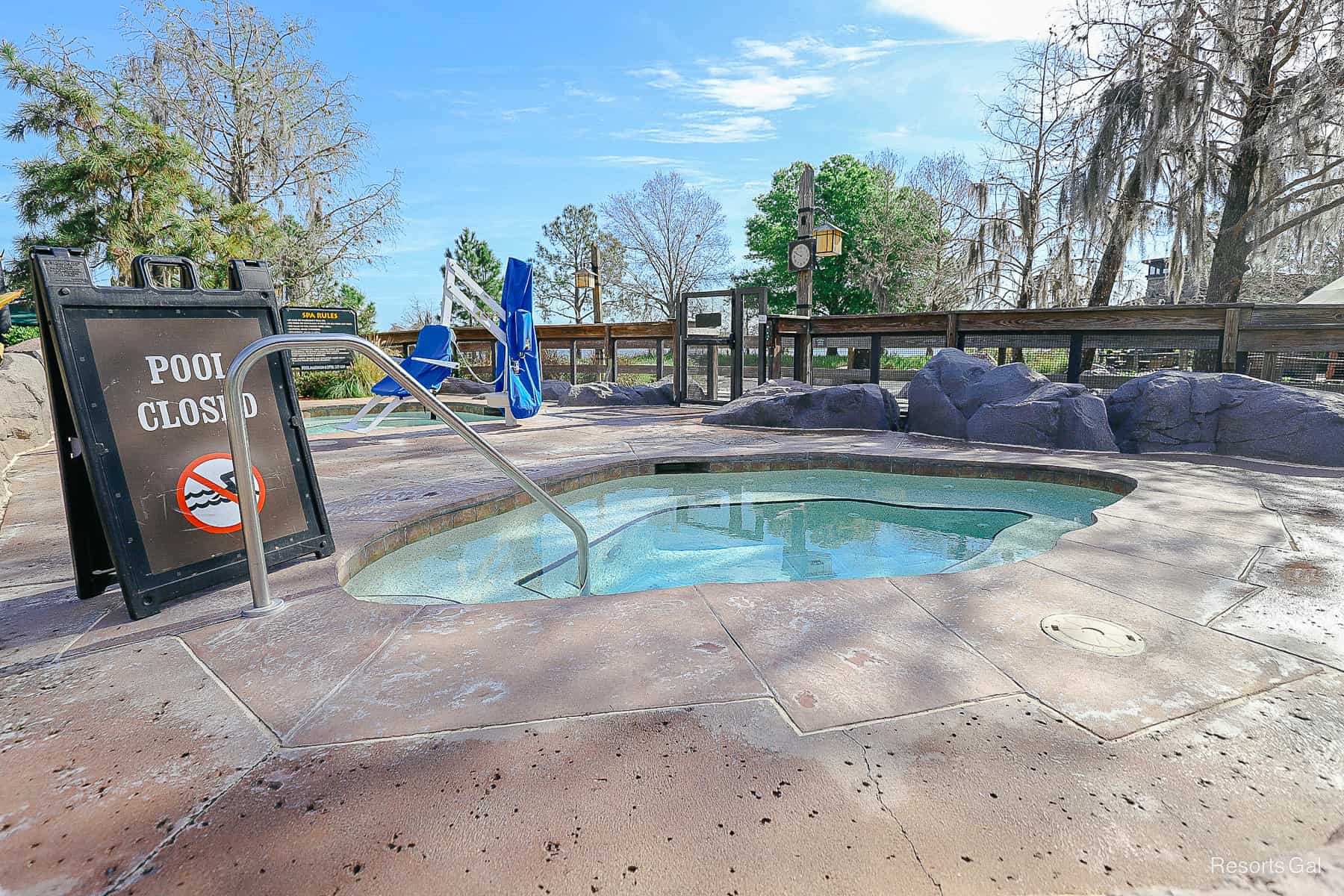 a whirlpool spa with rock surrounding it at the Copper Creek Springs Pool 