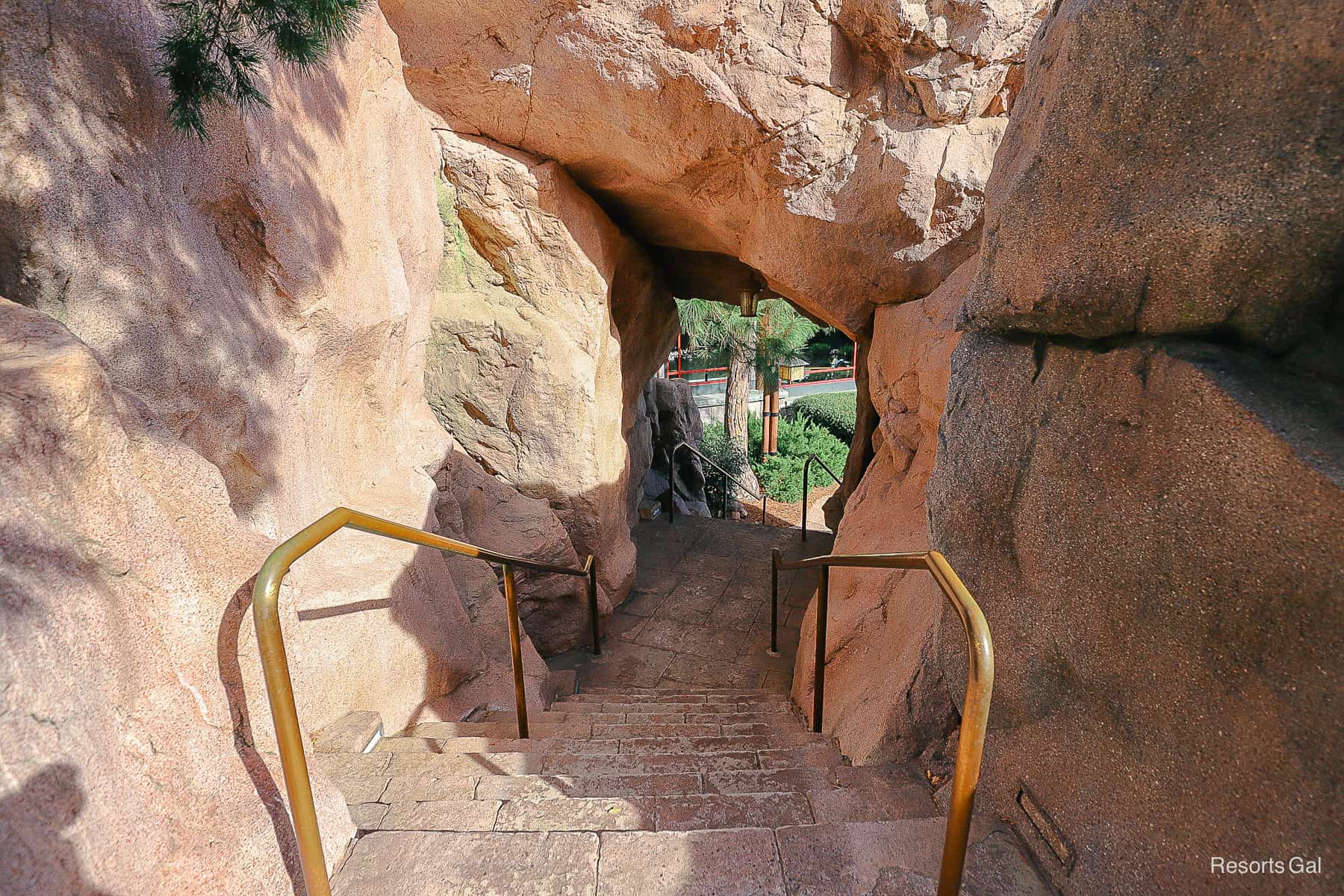 a cutout path through a boulder 