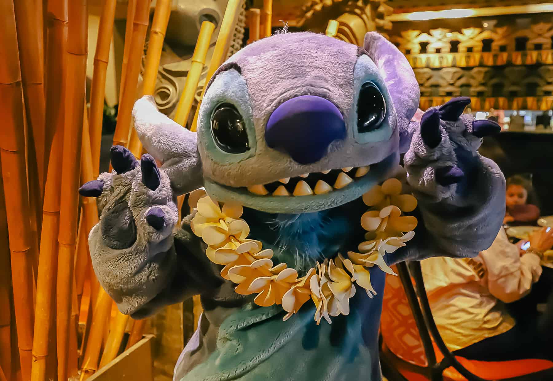 Stitch poses for a photo at the 'Ohana character breakfast. 