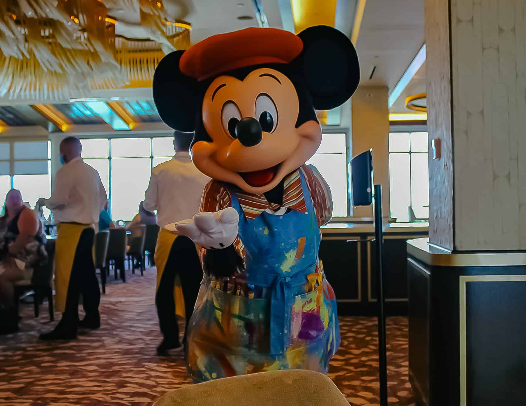 Mickey in his painter's apron at the Topolino's character breakfast. 