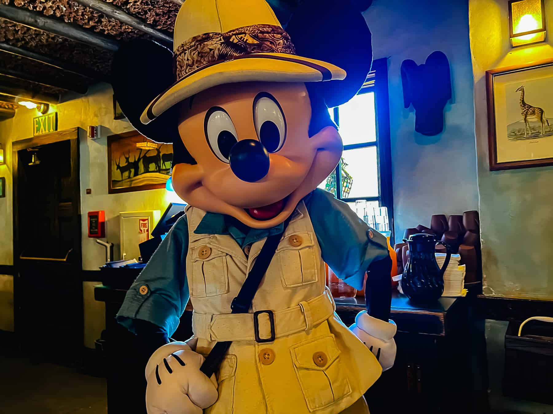 Mickey Mouse in a safari suit at Tusker House restaurant 