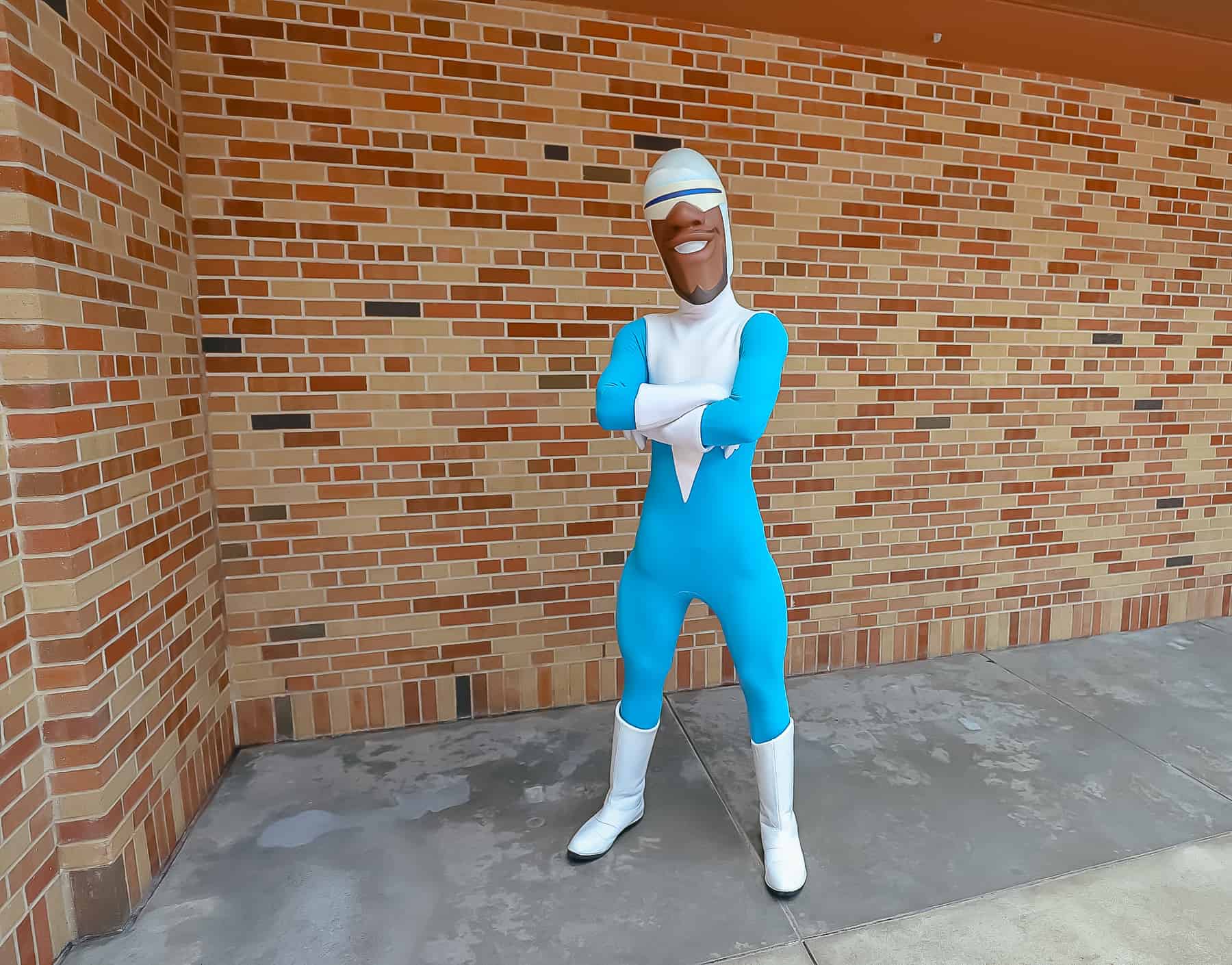 Frozone in front of a brick wall at Hollywood Studios. 