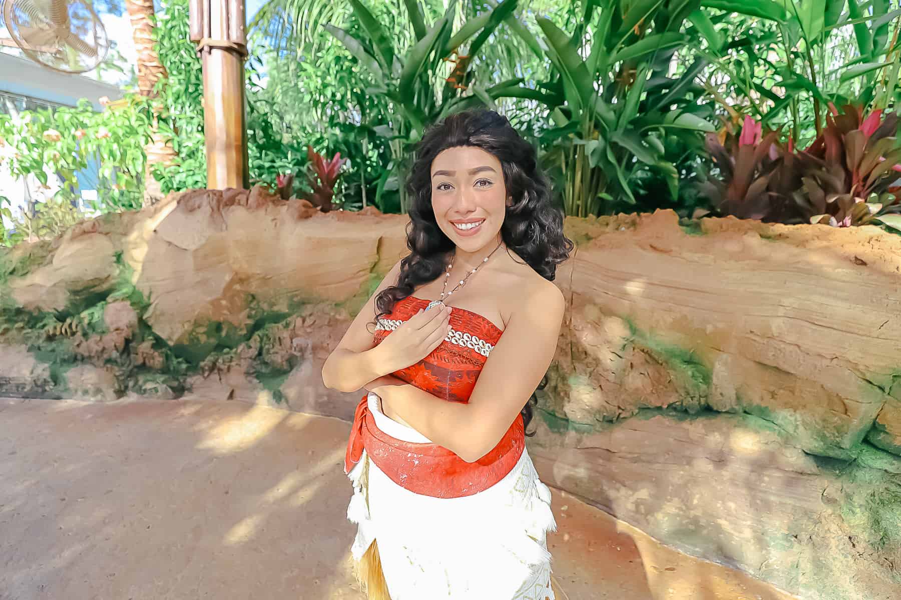 Moana wearing the heart of Te Fiti at Epcot. 