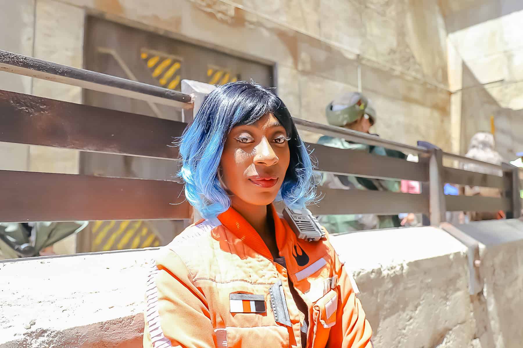 Vi Moradi stops to pose for a photo in Galaxy's Edge. 