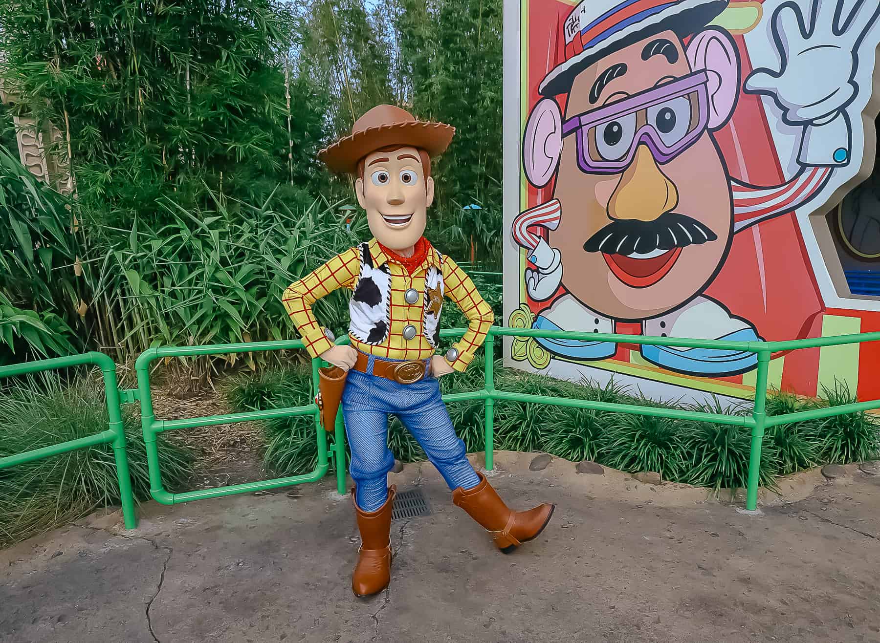 Woody poses outside of Toy Story Mania. 