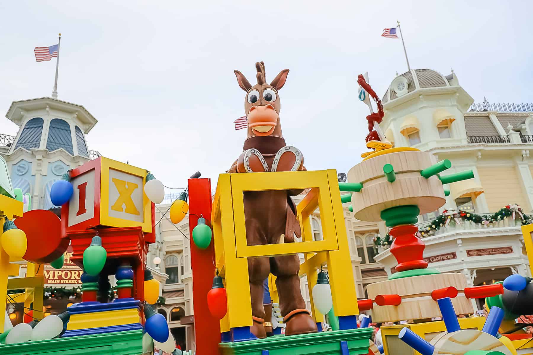 Bullseye perched on top of the Toy Story parade float.