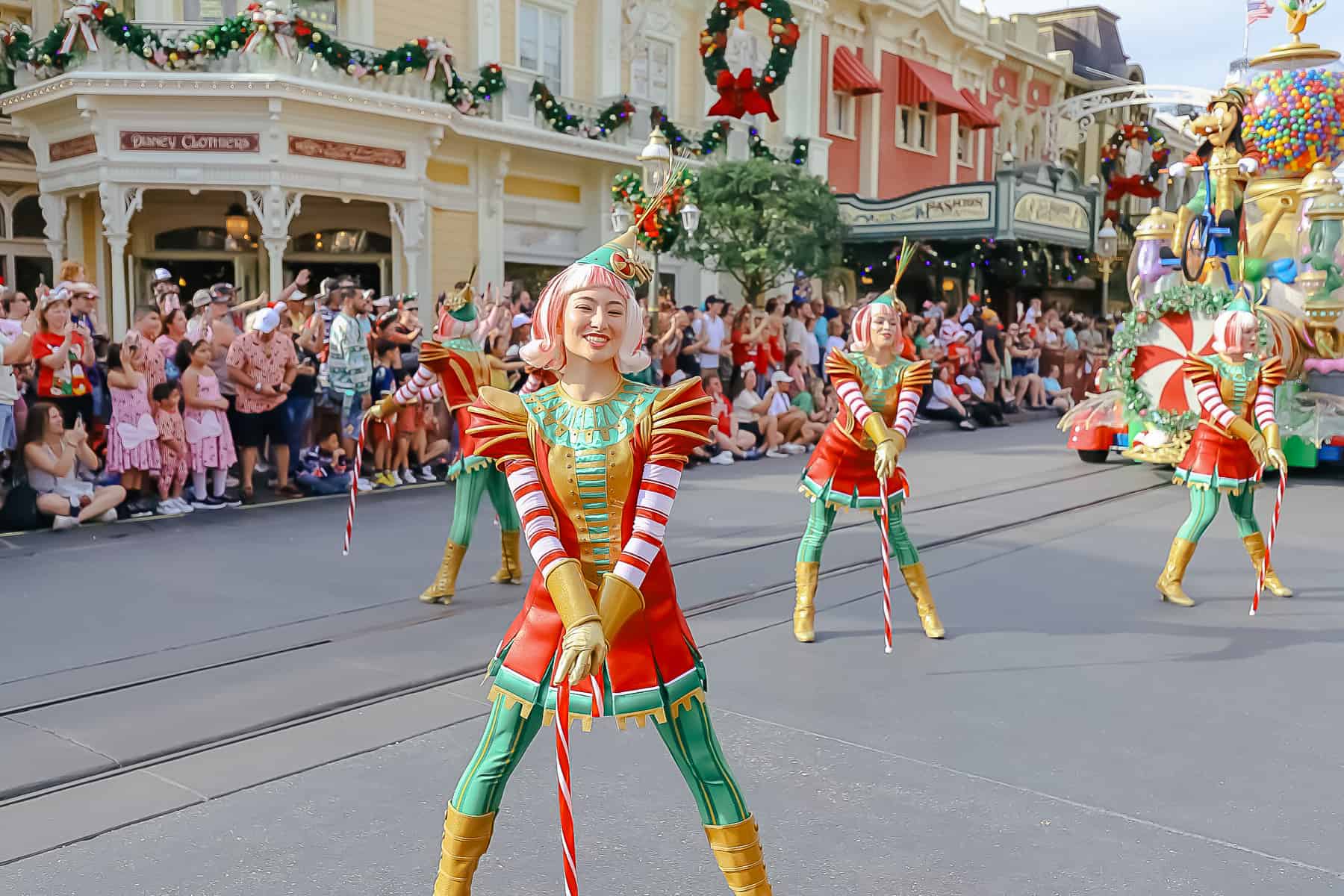 Dancers with Christmas Fashion and hair that's red and white like a candy cane. 